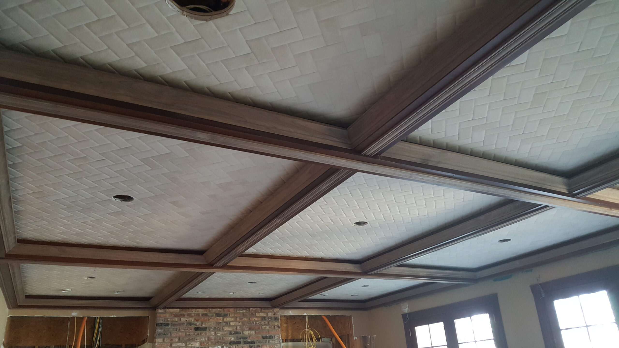 Decorative coffered ceiling with dark wood molding